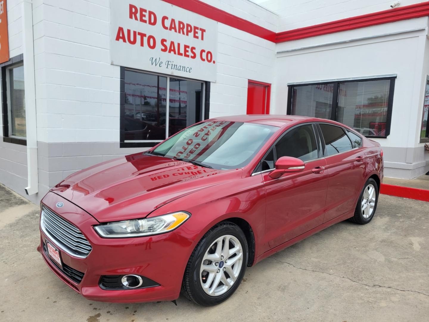 2013 Red Ford Fusion (3FA6P0HR3DR) with an 1.6L I4 F DOHC 16V engine, Automatic transmission, located at 503 West Court, Seguin, TX, 78155, (830) 379-3373, 29.568621, -97.969803 - Photo#0